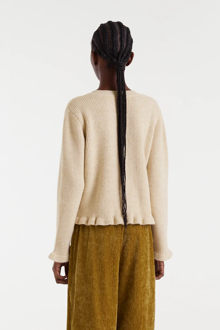 CÁRDIGAN CON VOLANTE BAJO