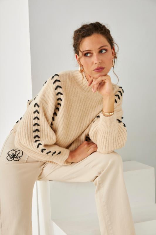 JERSEY CON MANGA GLOBO Y TRENZADO